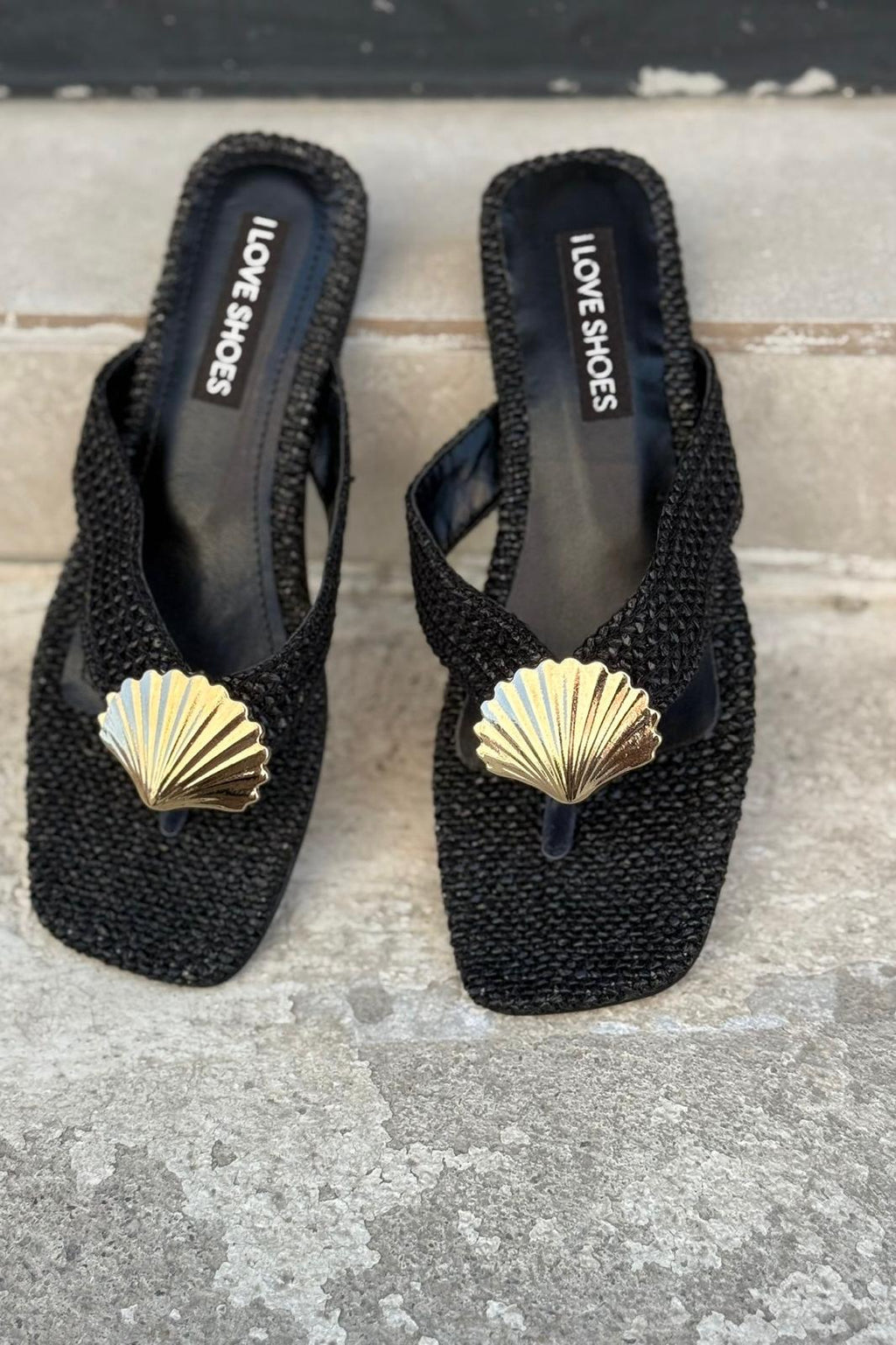 Lovante Woven Black Toe Ring Flat Sandals