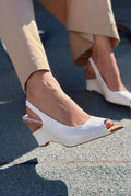 Nerov White crinkled faux leather women's wedge heel sandals