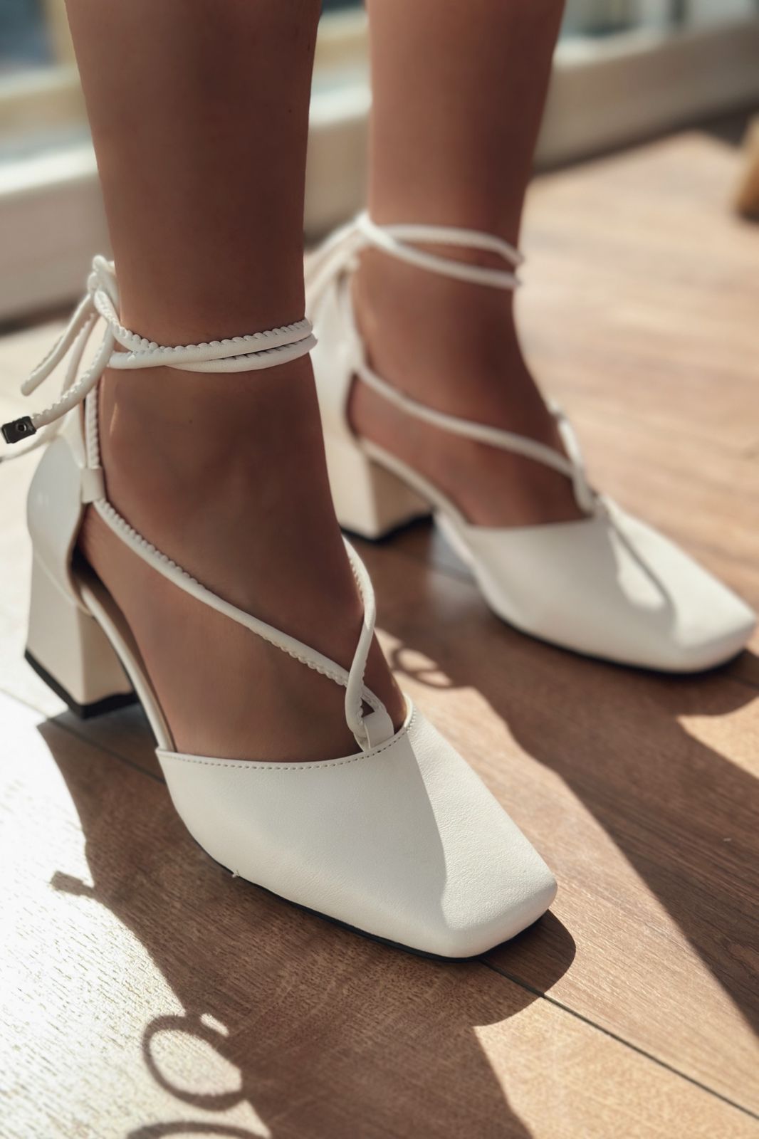 Penop White Faux Leather Ankle Strap Pumps