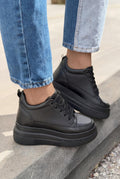 Korin Black Faux Leather Women's Hidden Wedge Sneakers