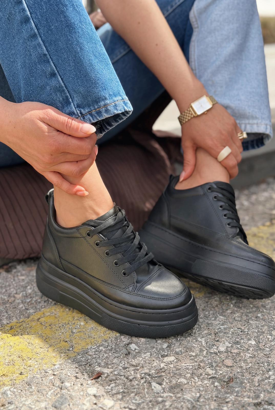 Korin Black Faux Leather Women's Hidden Wedge Sneakers