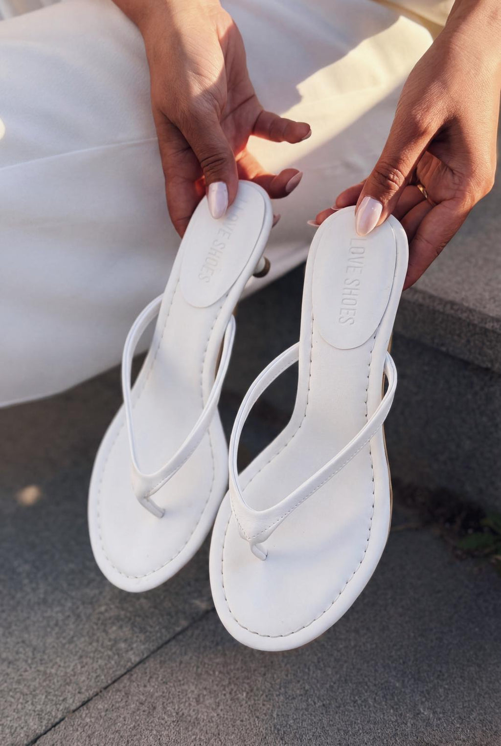 Arlene White Faux Leather Women's Toe Post Pumps