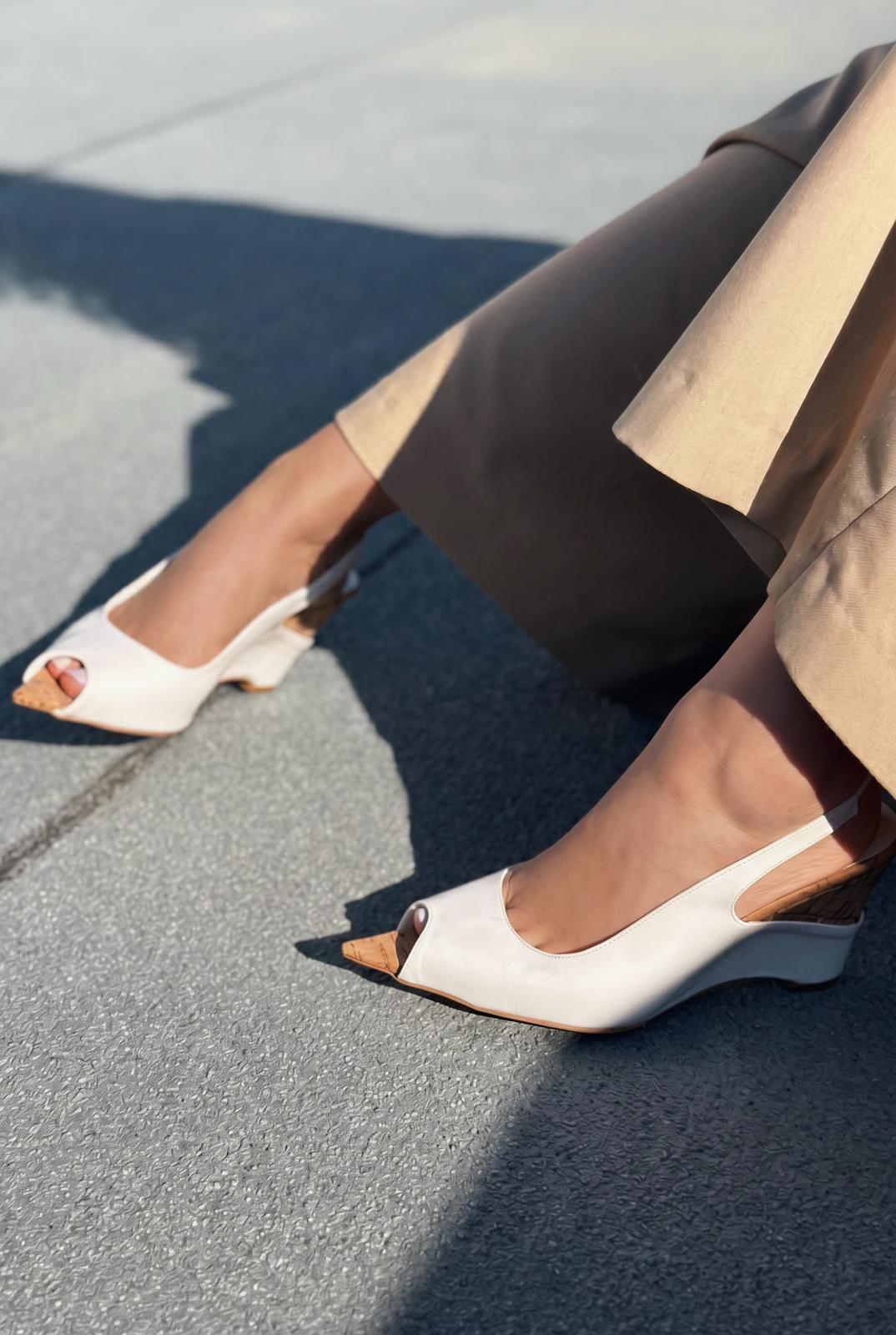 Nerov White crinkled faux leather women's wedge heel sandals