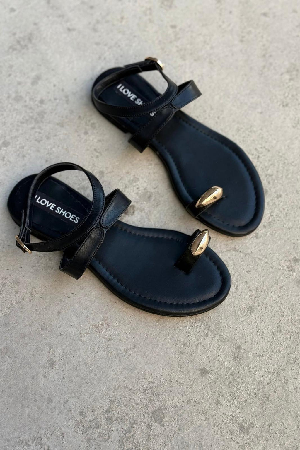Velinka Black Faux Leather Women's Thong Sandals