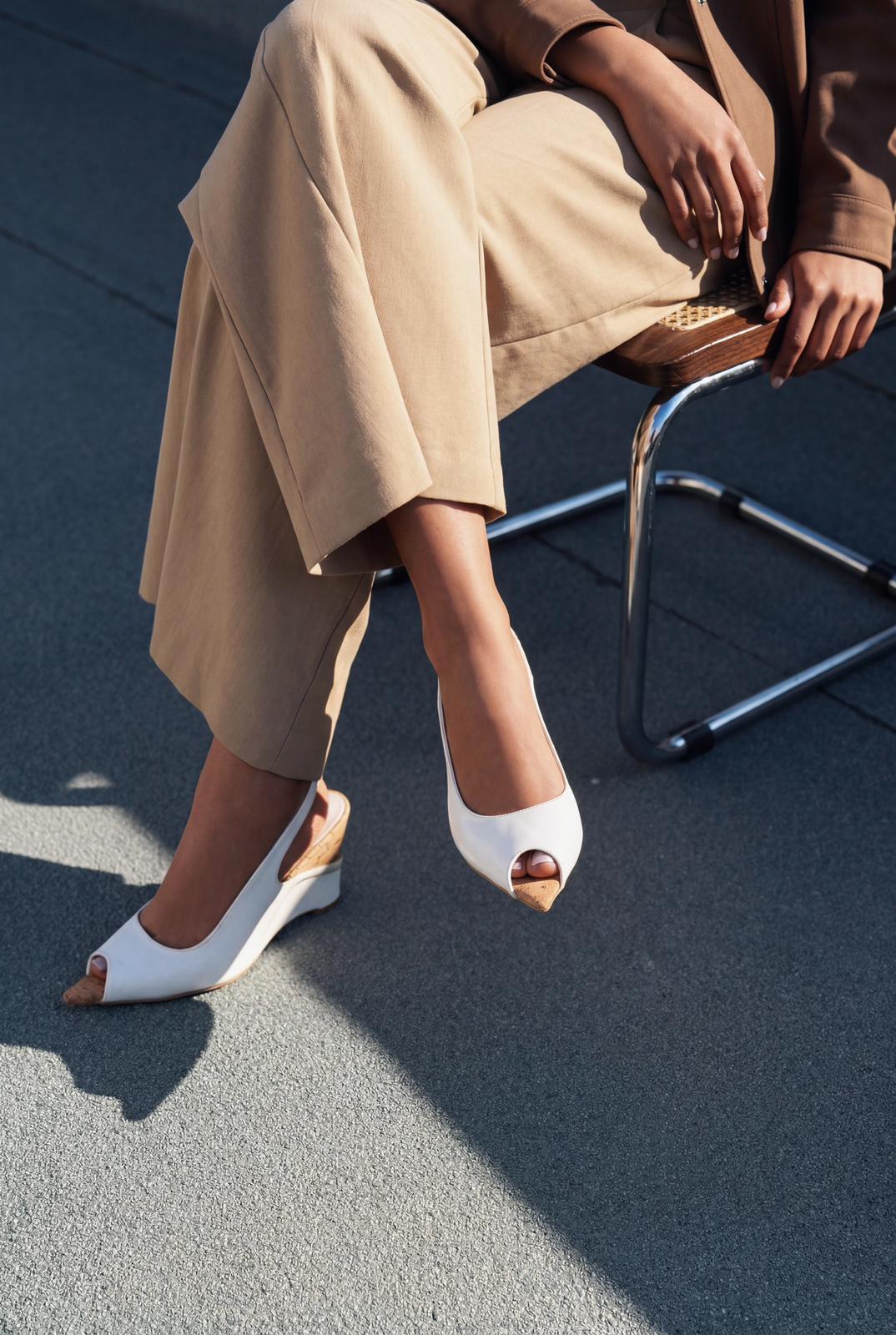 Nerov White crinkled faux leather women's wedge heel sandals